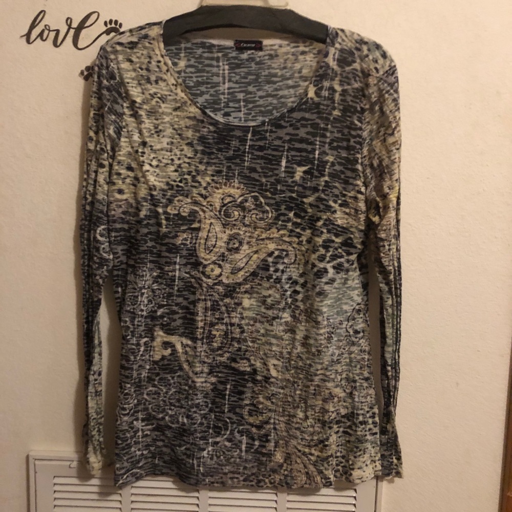 Thin Blouse. Stretchy material. Very comfortable.